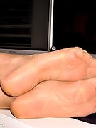 Office mature secretary in sheer to waist pantyhose